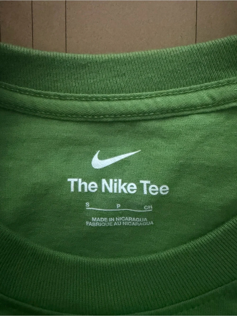 Nike Green Tee with White Swoosh and Text